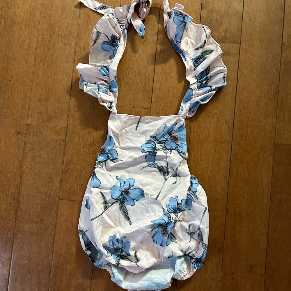 Bailey’s Blossom pink and blue floral onesie